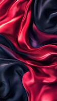 Elegant drapery featuring rich red and deep black fabric textures flowing together in a graceful arrangement photo