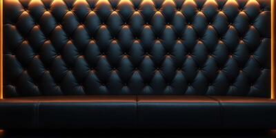 Elegant black leather couch with illuminated backdrop in modern interior setting at night photo