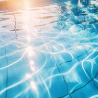 Tranquil Swimming Pool with Sunlight Reflections photo