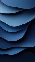 Layers of textured blue paper create an abstract design in captivating waves of color and depth photo