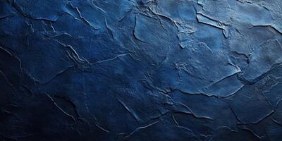 Textured dark blue wall with cracks and layers, creating a sophisticated atmosphere for modern designs photo