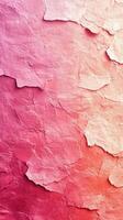 Textured pink and red paper layers create a visually striking abstract background in soft tones photo