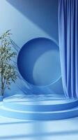 Blue minimalist stage with rounded backdrop and soft fabric curtain creating an inviting atmosphere for events photo