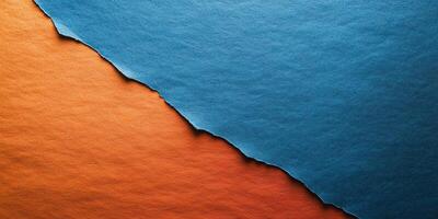 Colorful torn paper creating a striking contrast between blue and orange shades in an artistic display photo