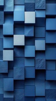 Textured blue wall featuring an arrangement of various sized blocks with deep shadows creating a dynamic visual effect photo