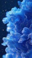Vibrant blue abstract waves create a mesmerizing visual effect against a dark background with soft glimmers of light photo