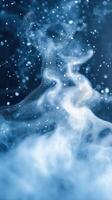 Ethereal mist swirls through the air in a mesmerizing display of light and movement during a nighttime setting photo