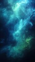Colorful abstract smoke swirling in a dark background creating a mysterious atmosphere photo