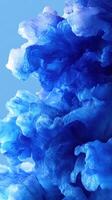 Vibrant blue abstract swirl of texture and motion captured in detail against a soft background photo