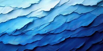 Abstract representation of ocean waves with varying shades of blue illustrating depth and movement photo