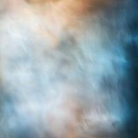 Abstract composition of soft colors blending in a smoky atmosphere with hints of blue and brown photo