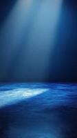 Atmospheric blue lighting fills an empty stage preparing for a performance at night photo