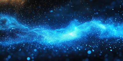 Vibrant blue cosmic background with shimmering particles creating a mystical atmosphere photo