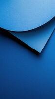Vibrant blue paper layers create an artistic composition showcasing texture and color nuances photo