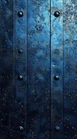Detailed close-up of weathered blue metal panels showcasing texture and wear under soft lighting photo