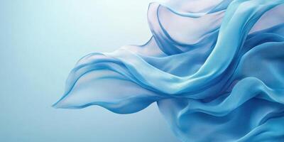 Fluid movements of light blue fabric in gentle waves creating a serene atmosphere and soft textures photo