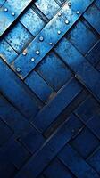 Textured blue and silver metal surface with woven pattern and rust details in industrial setting during daylight photo