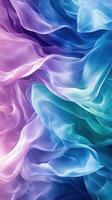 Vibrant fabric waves display gentle hues of purple, blue, and green in a flowing arrangement photo