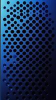 Metallic blue panel with perforated holes showcasing modern design elements photo