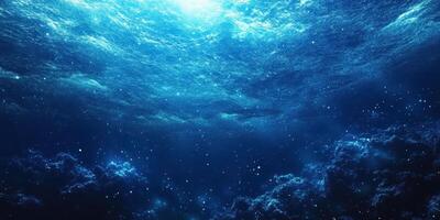 Mysterious underwater view showcasing the vibrant blue hues and swirling patterns of deep ocean currents in daylight photo