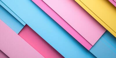 Colorful paper layers arranged diagonally with vibrant hues of pink, blue, and yellow creating a modern artistic backdrop photo