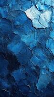 Textured blue surface with varied shades and reflections showcasing depth and artistry photo