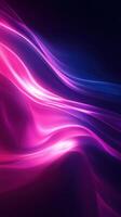 Flowing abstract waves in vibrant pink and blue colors create a visual rhythm in the dark background photo