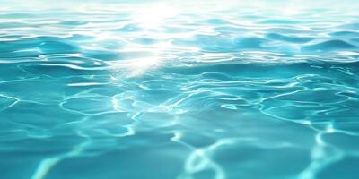 Clear turquoise water reflecting sunlight creates a serene aquatic view in a calm environment photo