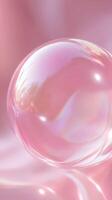Translucent pink bubble reflecting soft hues and gentle light in a whimsical setting photo