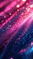 Vibrant shimmer and sparkle of fine glitter in shades of pink and blue with soft lighting effects photo