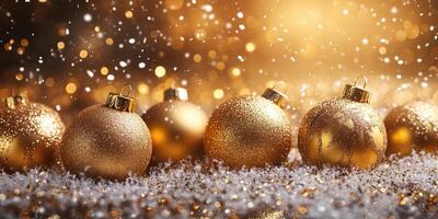 Shimmering gold Christmas ornaments surrounded by sparkling snowflakes in a warm festive setting photo
