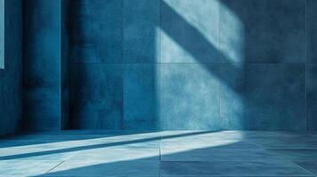 Monochromatic blue interior with sunlight creating shadows on tiled walls and floor, creating a calm and minimalist space. photo