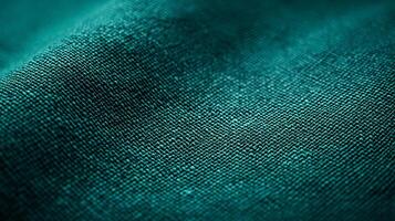 Close up of a green fabric with a pattern. The fabric is smooth and has a shiny appearance photo