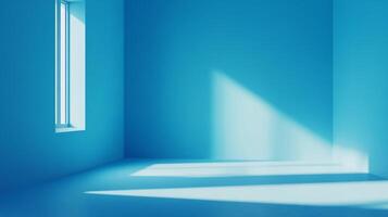 A bright empty blue room with light streaming through the window. Light and shadow create simple geometric shapes on floor and walls. photo