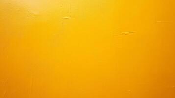 Vibrant yellow wall background with visible brushstrokes and imperfections, creating a textured and colorful backdrop photo