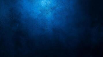 Deep blue textured background evokes a sense of mystery and depth, perfect for creating a moody and atmospheric design photo
