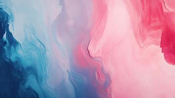 Pink and blue acrylic paint mixing, creating abstract swirls and a beautiful marble effect photo