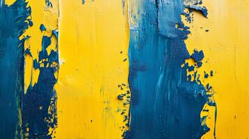 Abstract texture featuring vibrant yellow and deep blue paint strokes, creating a textured and visually striking colorful surface. photo