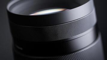 Macro shot showcasing a sleek, black camera lens with textured grip rings, highlighting precision engineering and optical technology. photo