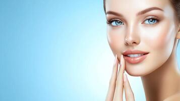 Flawless complexion of a beautiful woman. Ideal for skincare, beauty, and cosmetics. The blue backdrop emphasizes her stunning features. photo