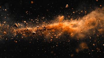 A dynamic cloud of earthen particles exploding against a dark background, creating a dramatic and abstract visual effect. photo