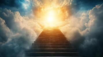 Stone stairway leading upwards into fluffy white and dark clouds, with a shining golden glow at the end of the staircase. photo