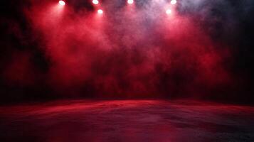 Illuminated stage bathed in red light and smoky atmosphere, creating a dramatic and vibrant setting for performance or display. photo