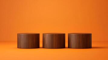Three wooden cylinder podiums on a solid orange backdrop, ready to elevate your product presentation with minimalist charm and warm tones. photo