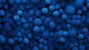 A deep blue swarm of orbs, each covered in minute spheres, creates a mesmerizing, fractal-like pattern. Intense and intriguing. photo