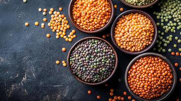 A colorful assortment of lentils, offering a variety of textures and nutritional benefits, perfect for diverse culinary applications. photo