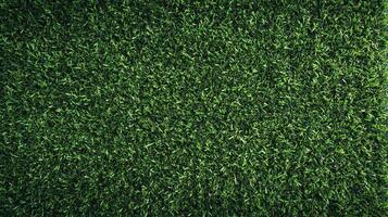 Close-up of vibrant green artificial turf. Perfect for backgrounds, textures, and creating a lush, inviting visual experience. photo