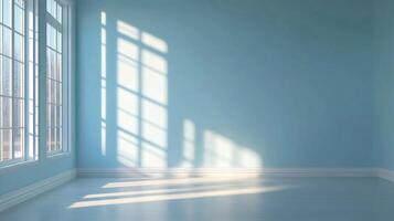 Sunlight streams through a window into an empty blue room, casting shadows on the wall and floor. The room is minimalist and serene. photo