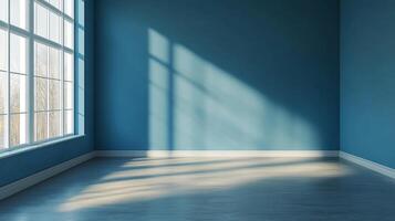 A light blue room is illuminated by light coming in through a window, creating contrasting shades on the walls and floor. Fresh start. photo
