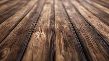 An eye-level shot showcases a dark, rustic wood floor in sharp focus, highlighting the natural grain and aged texture. Warm tones dominate. photo
